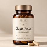 Celest Universe Sweet Reset amber bottle with champagne cap, ivory label and two capsules on a warm neutral surface